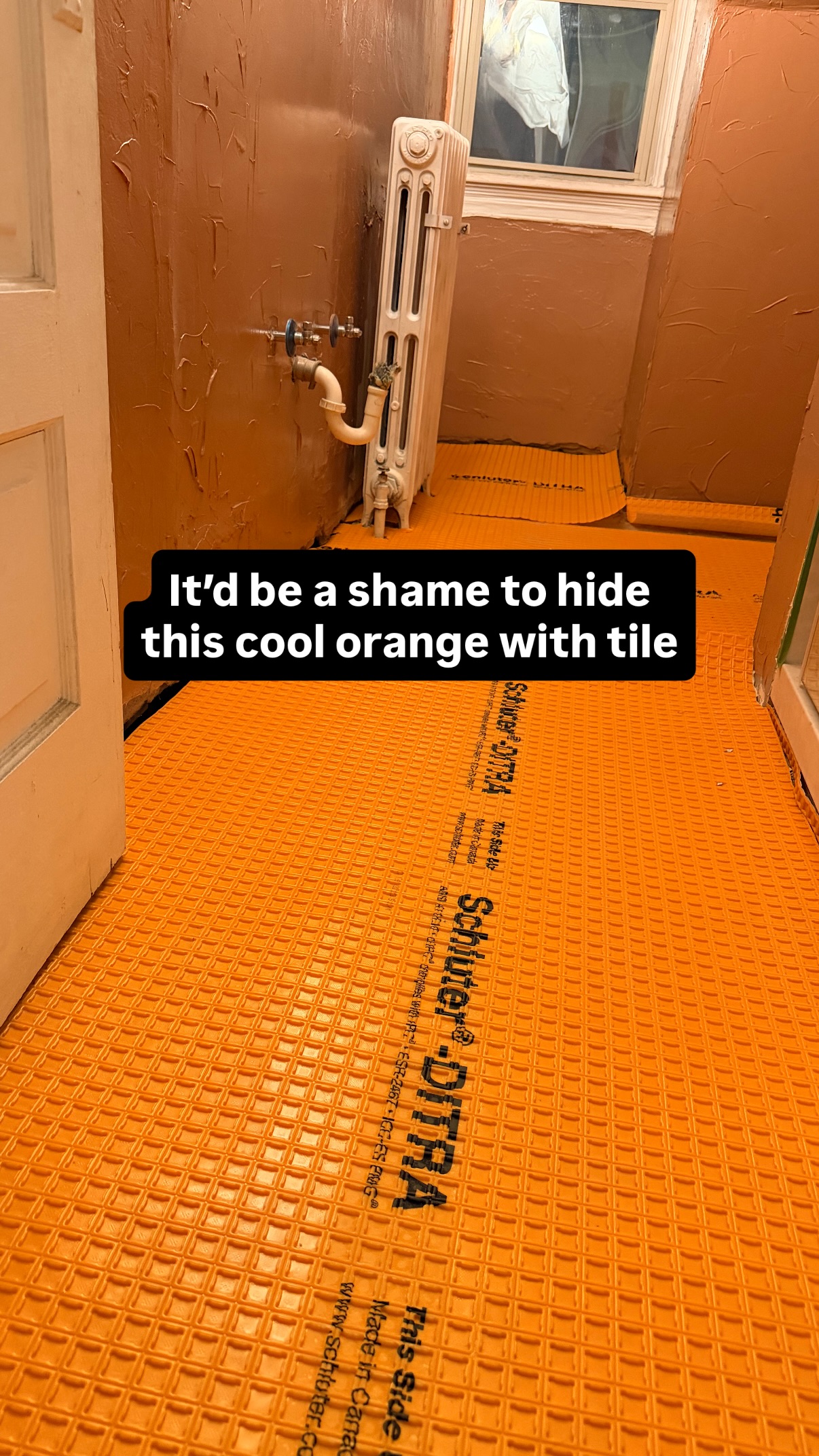 It’d be a shame to hide this cool orange with tile