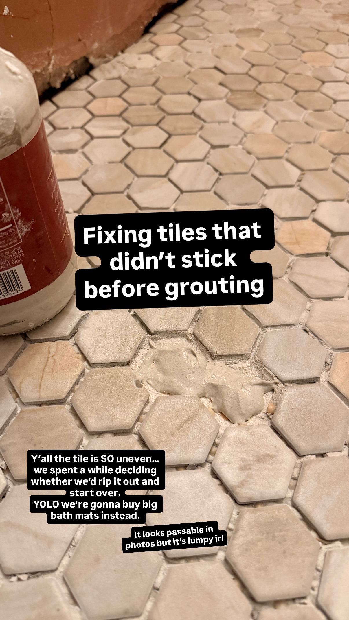 Fixing tiles that didn’t stick before grouting Y’all the tile is SO uneven…we spent a while deciding whether we’d rip it out and start over.
YOLO we’re gonna buy big bath mats instead.  It looks passable in photos but it’s lumpy irl