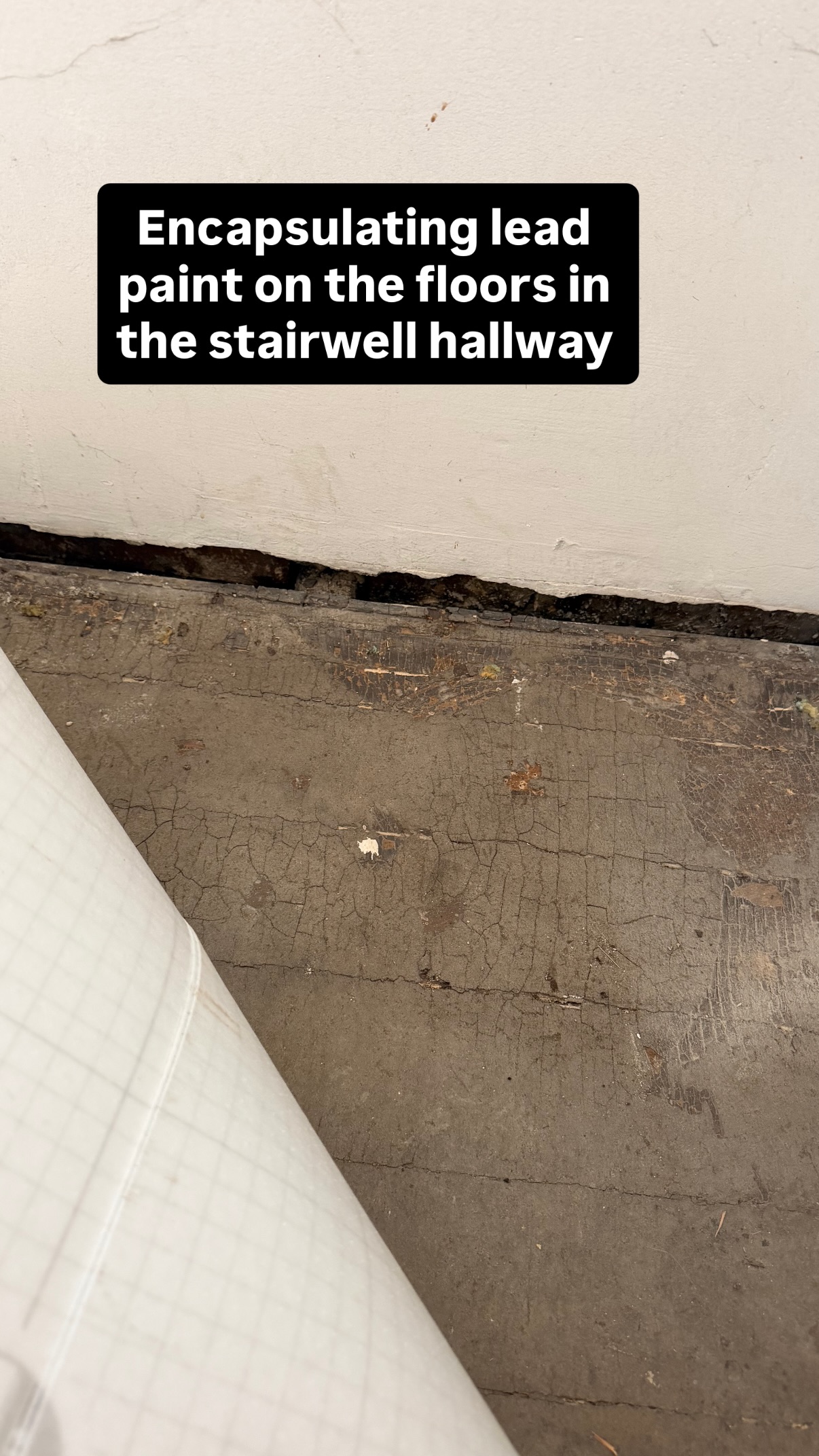 Encapsulating lead paint on the floors in the stairwell hallway