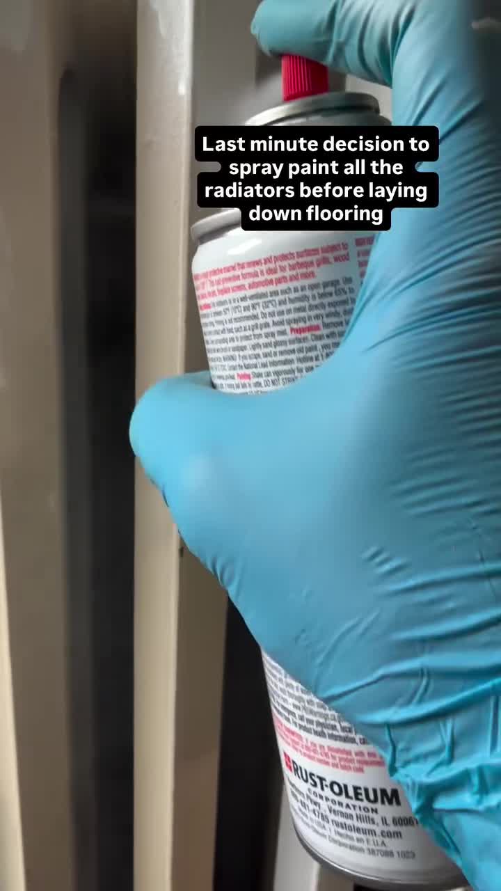 Last minute decision to spray paint all the radiators before laying down flooring