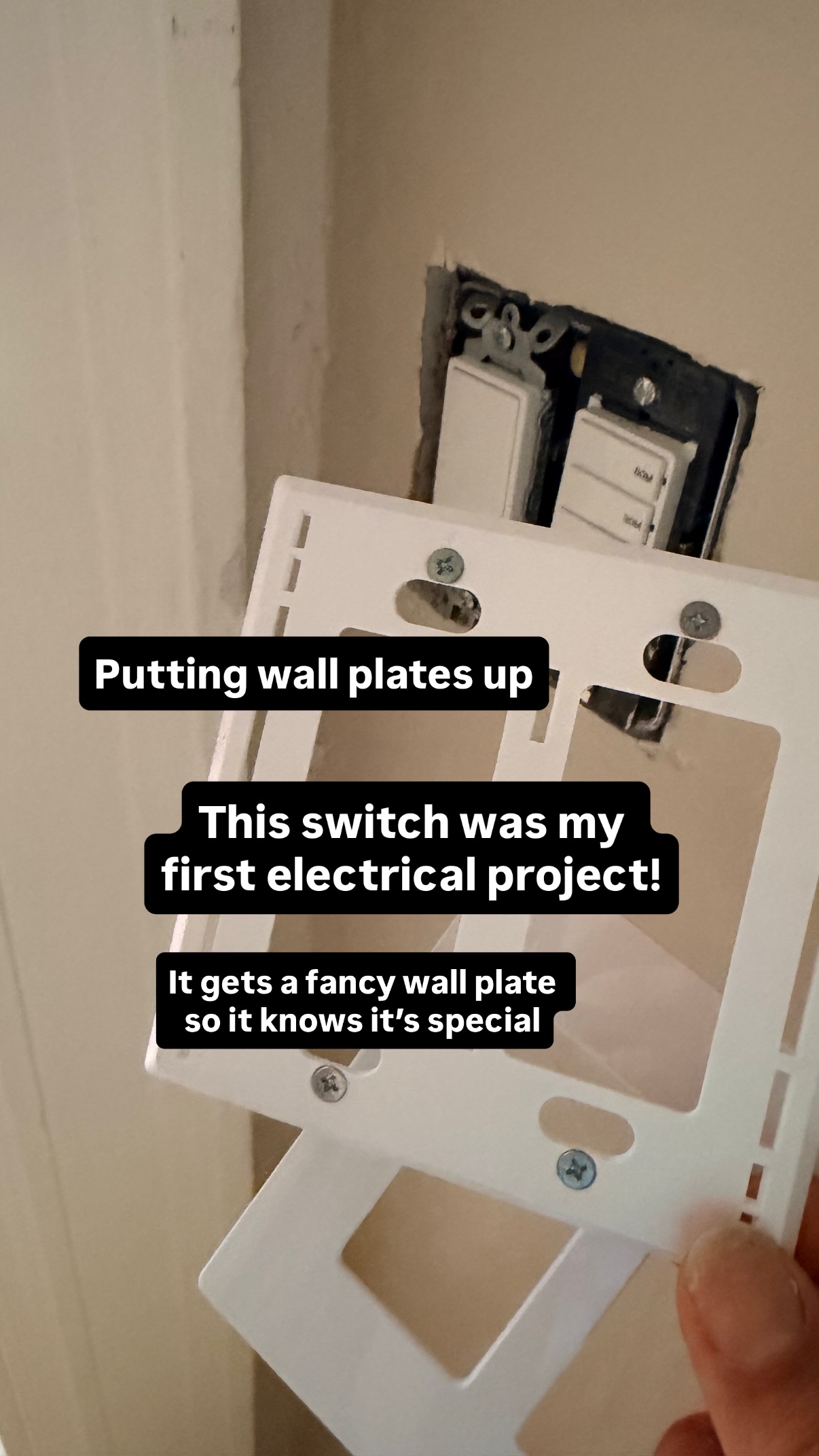 Putting wall plates up This switch was my first electrical project! It gets a fancy wall plate so it knows it’s special
